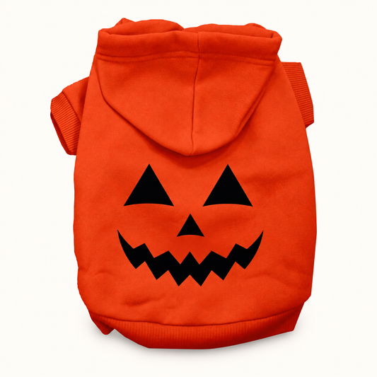 Pumpkin Face Halloween Pet Hoodie on a cream background